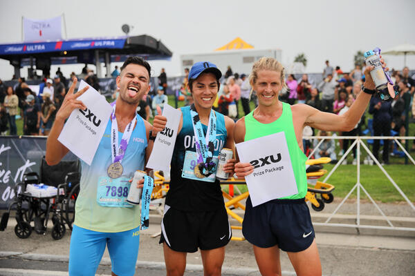The top three male finishers in the 13.1-mile half marathon...