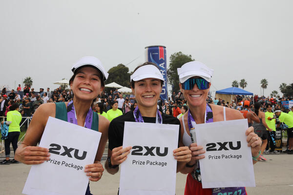 The top three female finishers in the 26.2-mile full marathon...