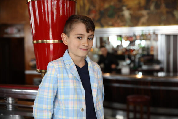 Alexandru Triculescu from Michigan celebrates his 9th birthday visiting the...