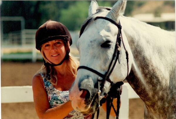 Dia Abrams with one of her beloved horses at her...